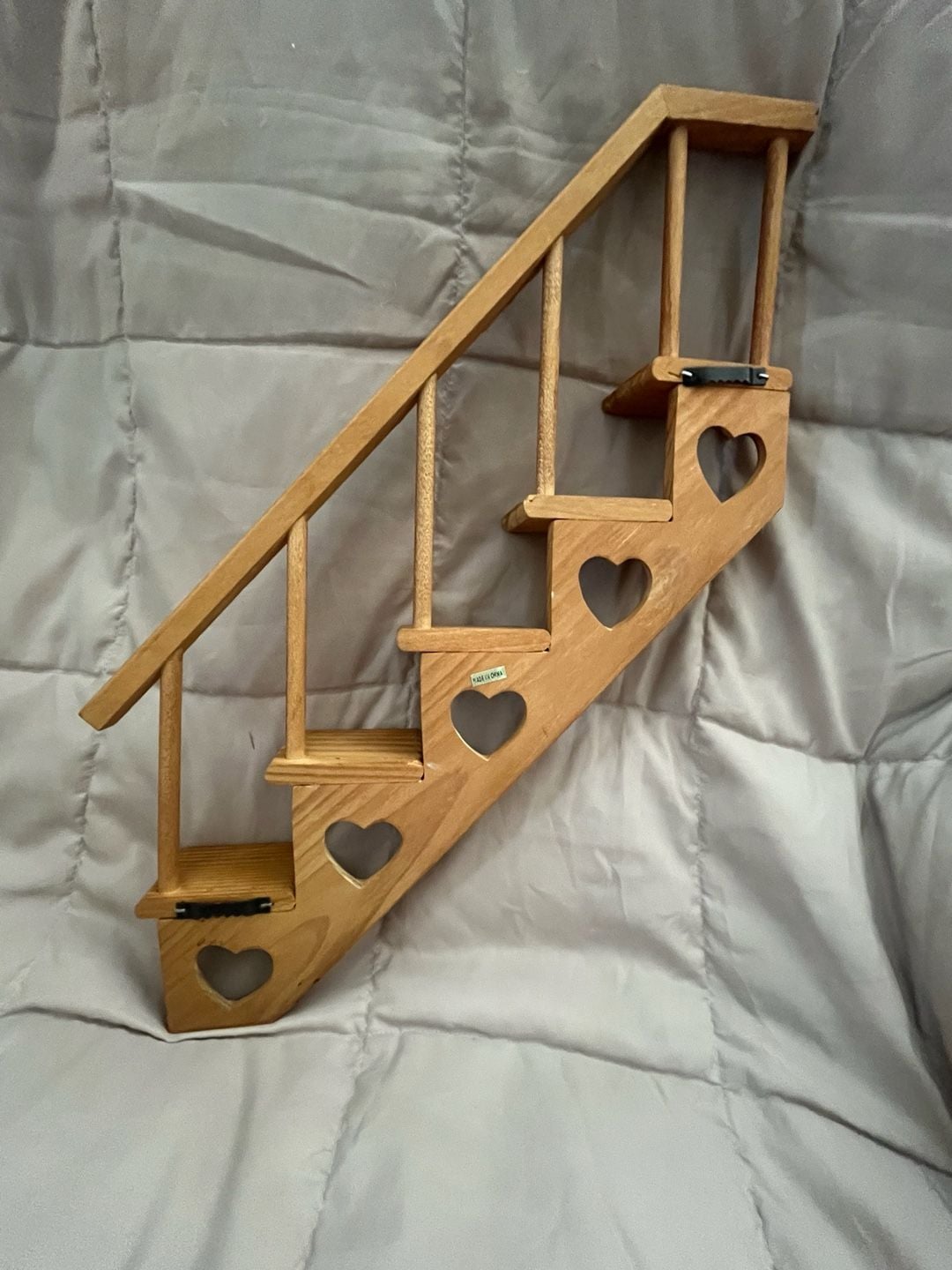 1980s wooden staircase shelf with heart cutouts 5