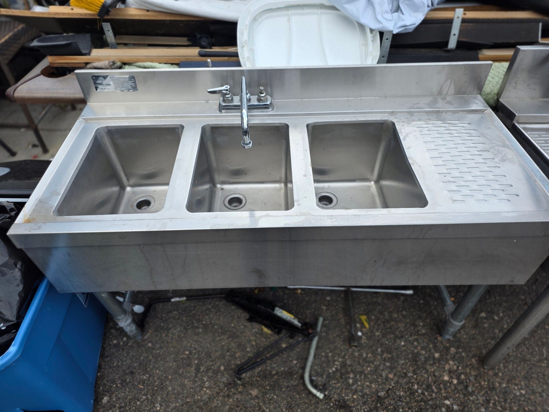 Advance Tabco CRB-43L-X Three Compartment Sink with Drainboard 1