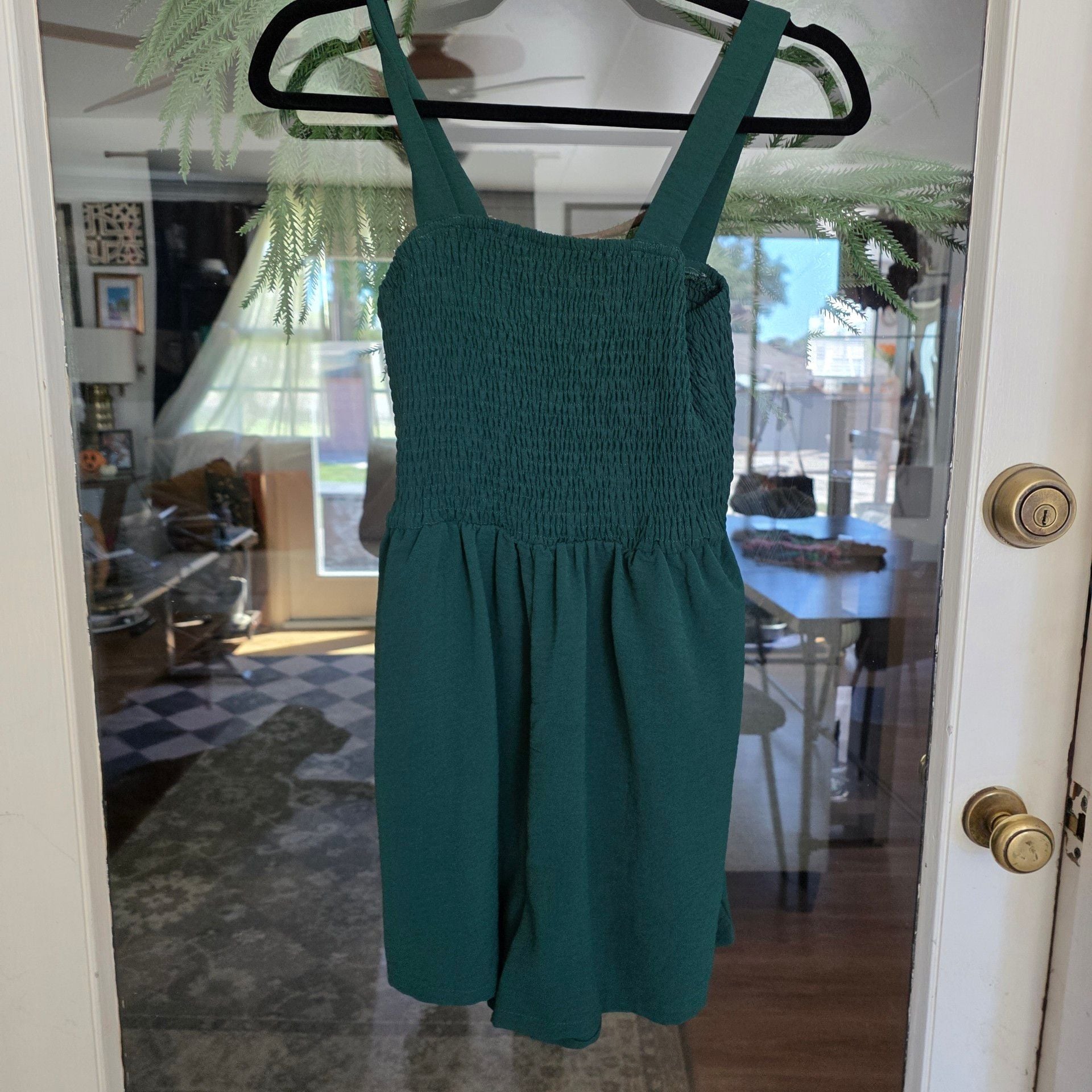 Green Smocked Romper Size small
1