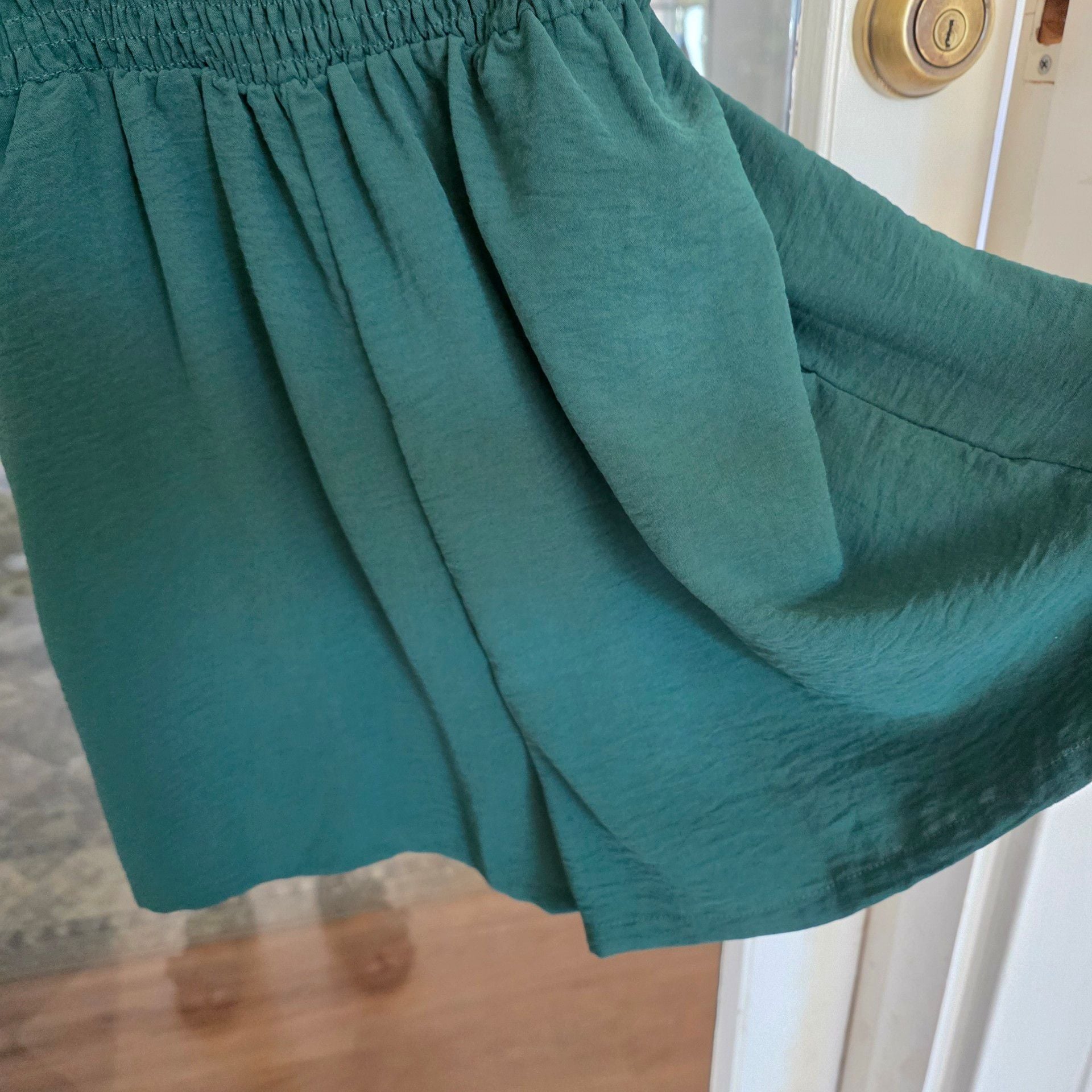 Green Smocked Romper Size small
3