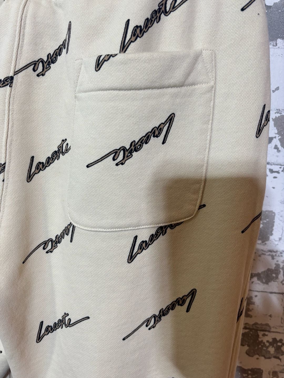 Lacoste print all over cream joggers M 5