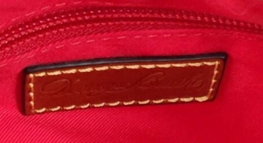 Dooney & Bourke Nylon Crossbody Bag in peach / coral hue. Retail: $159 10