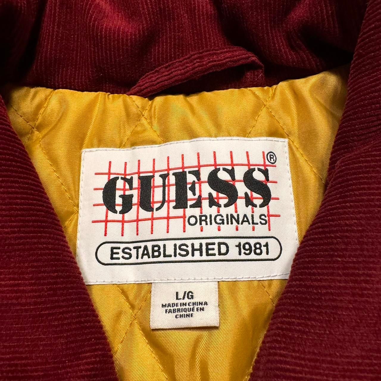 Guess varsity burgundy jacket with gold quilted lining and patches Large
5