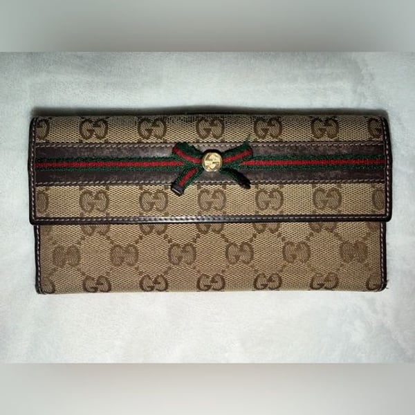 Vintage Gucci GC canvas web bow continental wallet