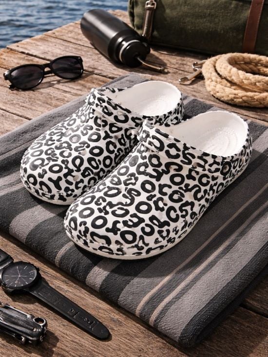 Crocs Classic Warped Logo Clog White Black Mens 10 Womens 12 Rare NWT 2