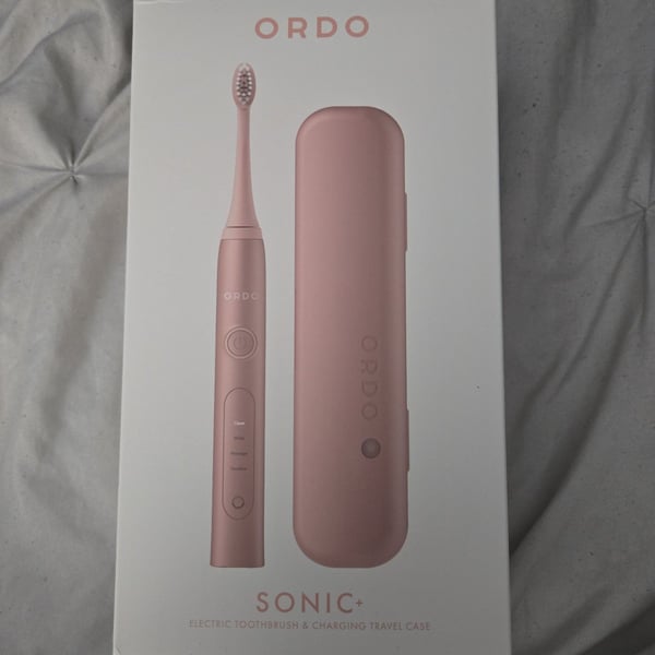 New Ordo sonic + electric toothbrush charging travel case rose gold