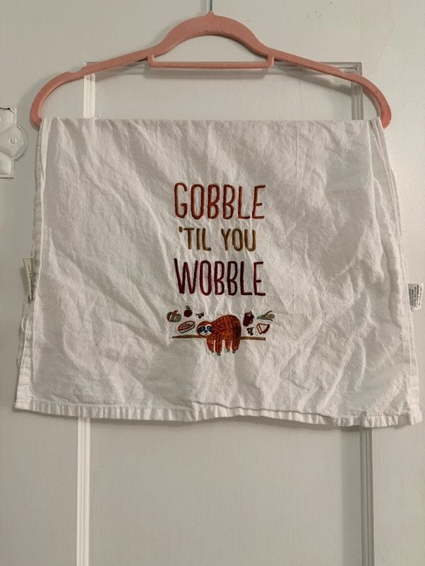 White Embroidered “Gobble Til You Wobble” Sloth Tea Towel 1