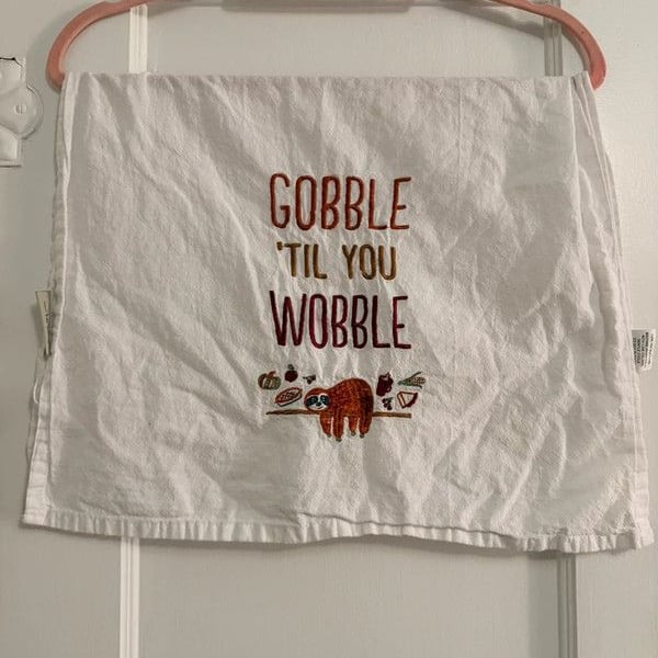 White Embroidered “Gobble Til You Wobble” Sloth Tea Towel