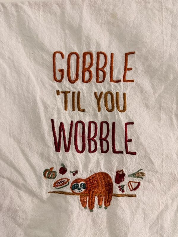 White Embroidered “Gobble Til You Wobble” Sloth Tea Towel 2