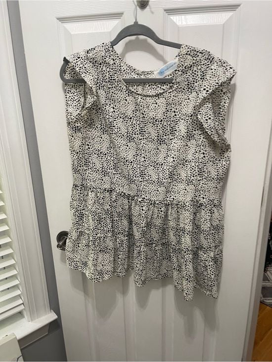 Sleeveless Black & White Dotted Ruffle Peplum Blouse 2