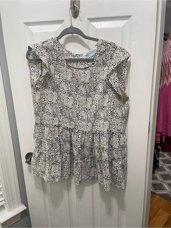 Sleeveless Black & White Dotted Ruffle Peplum Blouse 3