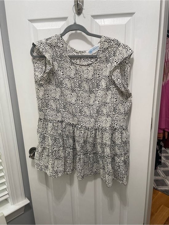 Sleeveless Black & White Dotted Ruffle Peplum Blouse 4