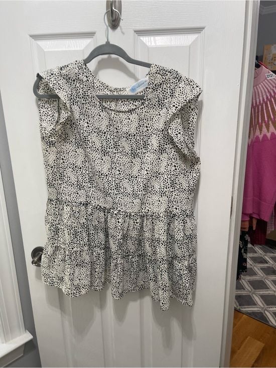 Sleeveless Black & White Dotted Ruffle Peplum Blouse 5