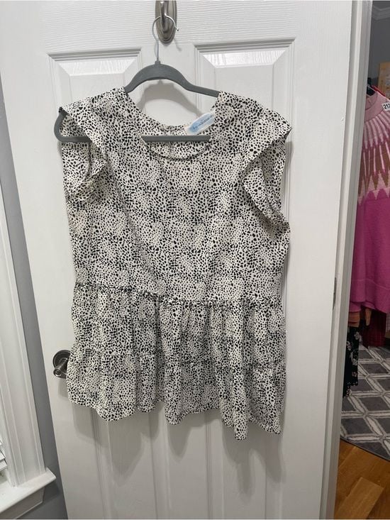 Sleeveless Black & White Dotted Ruffle Peplum Blouse 7