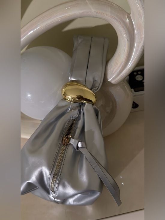 A Classy Chic Boutique Silver Mini Knot Bag with Gold Accent 11
