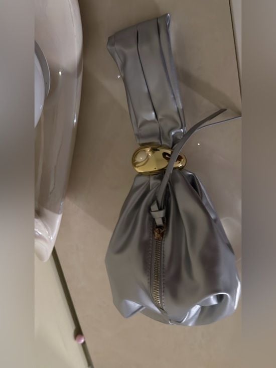 A Classy Chic Boutique Silver Mini Knot Bag with Gold Accent 16