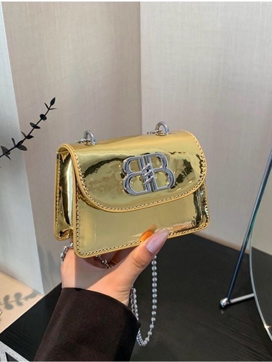 A Classy Chic Boutique Gold Metallic Mini Crossbody with Silver Logo 2