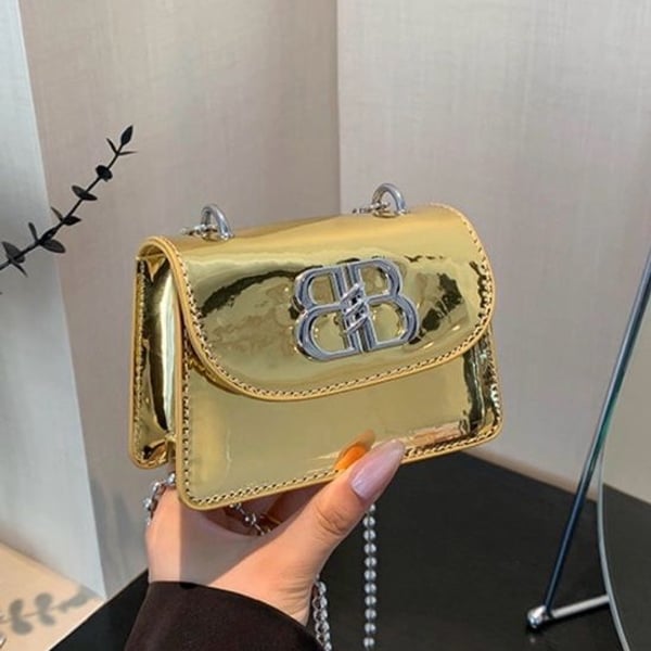 A Classy Chic Boutique Gold Metallic Mini Crossbody with Silver Logo