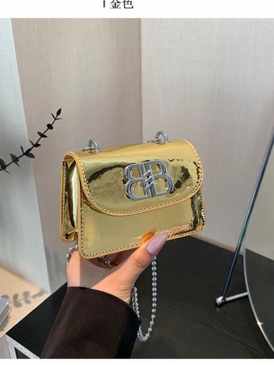 A Classy Chic Boutique Gold Metallic Mini Crossbody with Silver Logo 4