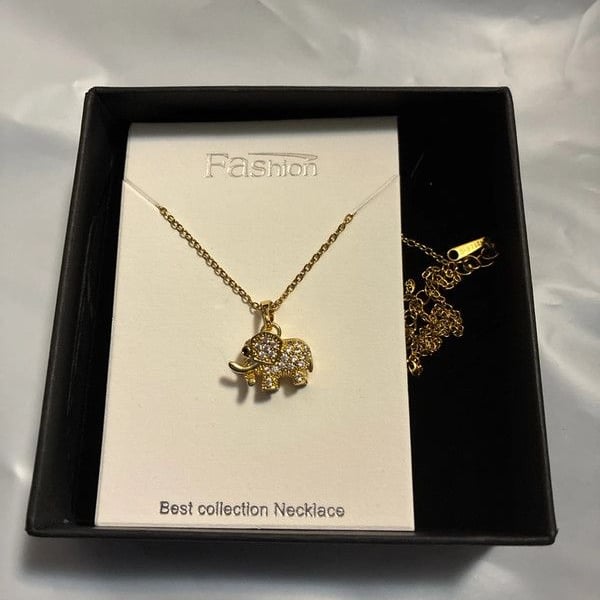 New in box fashion necklace elephant pendant gold tone rhinestone