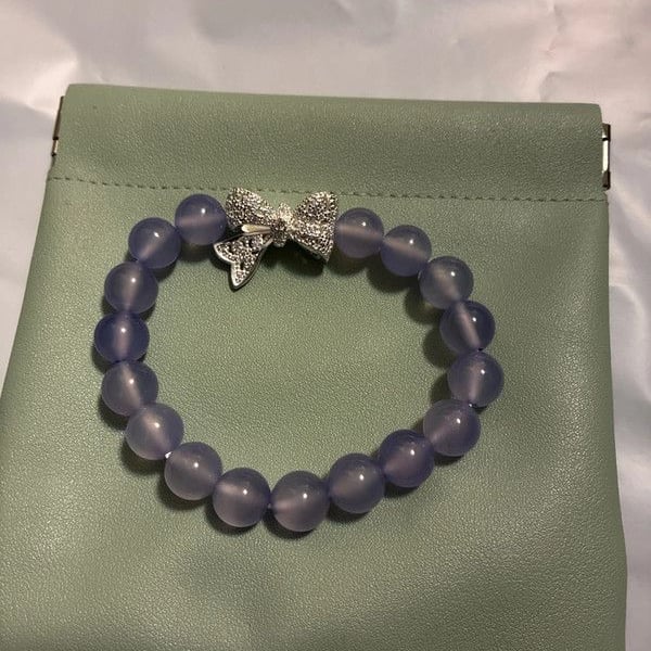 New wo tags purple crystal bracelet silver tone bow in pouch