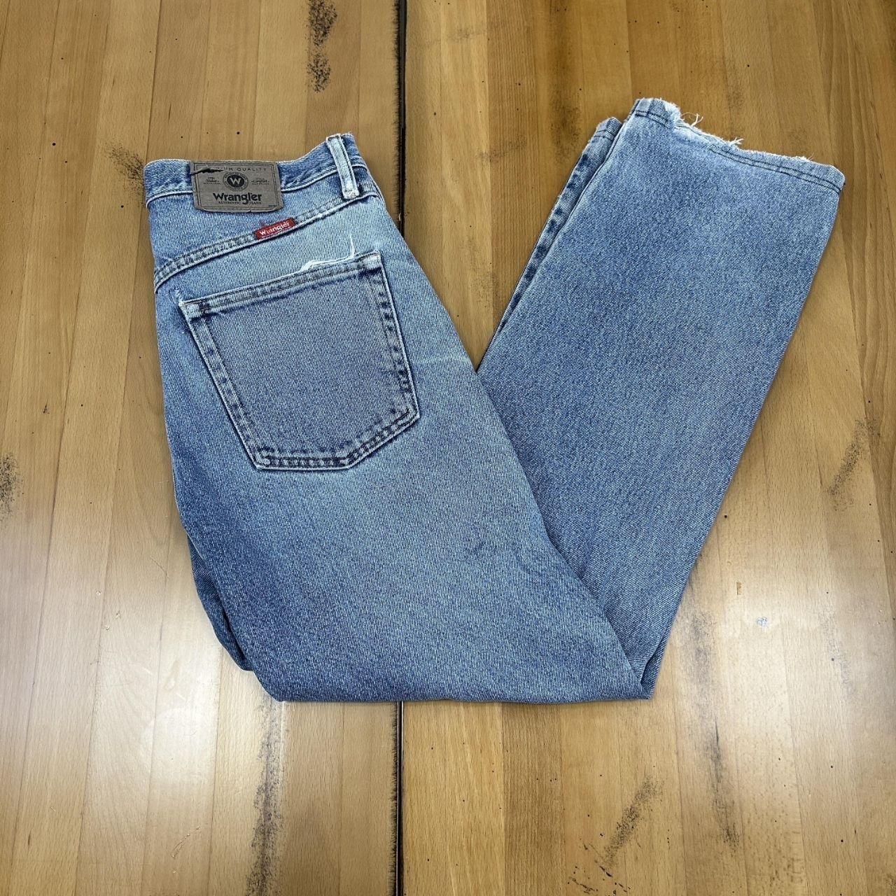 Wrangler Light-Wash Distressed Blue Jeans 7
