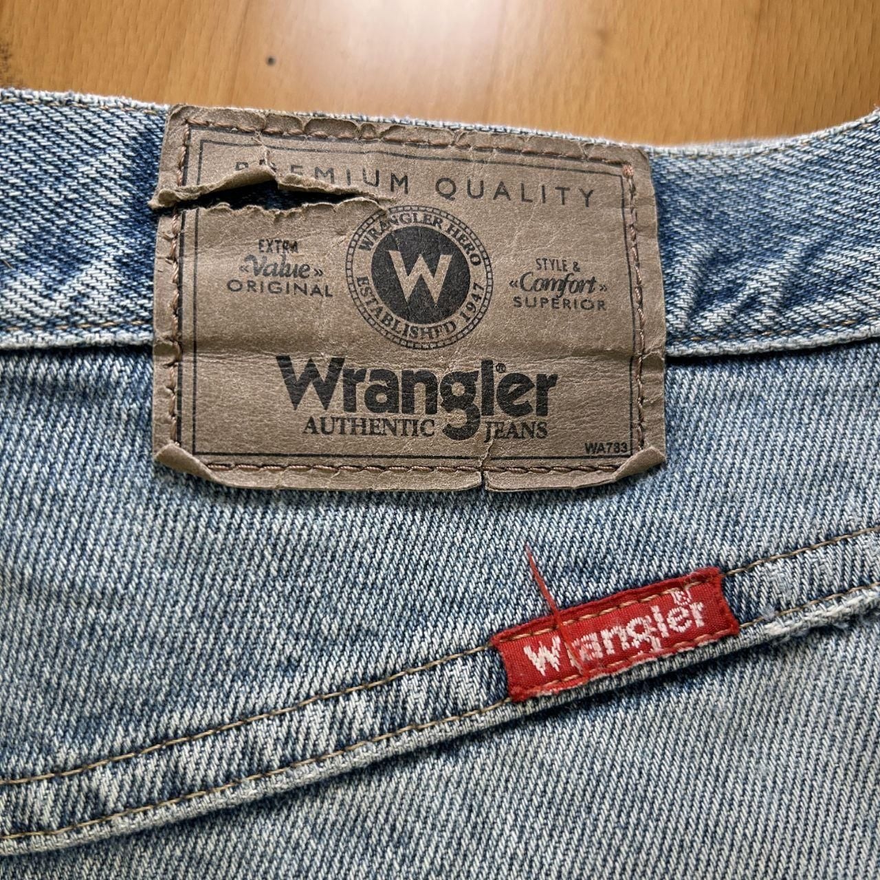 Wrangler Light-Wash Distressed Blue Jeans 8