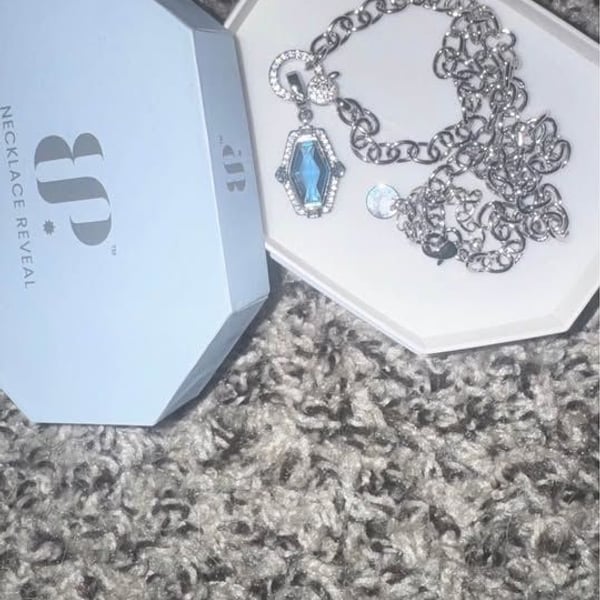Bomb party link necklace with blue stone pendant